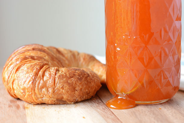 apricot jam dripping from a canning jar