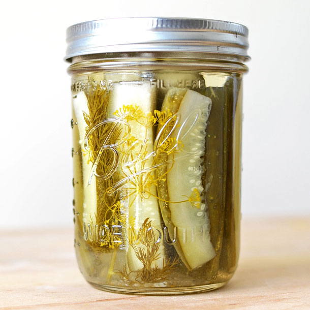 The PERFECT recipe for small batch crunchy canned dill pickles! Complete with tips on how to can, how to make them look beautiful in the jar, and how get that coveted pickle "crunch!" | simpleseasonal.com