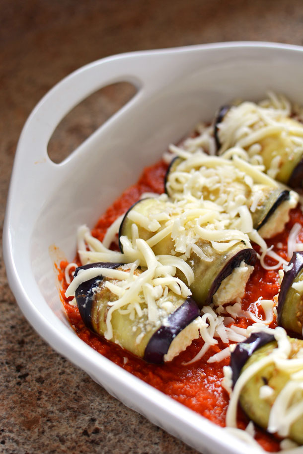 This amazing, lightened-up Italian dish combines the flavors of eggplant parmesan and stuffed shells. This recipe is one of our favorites because it's naturally lighter, yet still BURSTING with cheesy goodness!