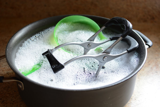 Washing Canning Tools and Lids in Hot Soapy Water