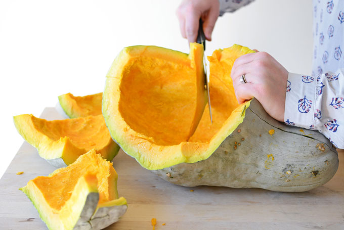 Cut a Blue Hubbard Squash by Rocking the Knife to Crack It