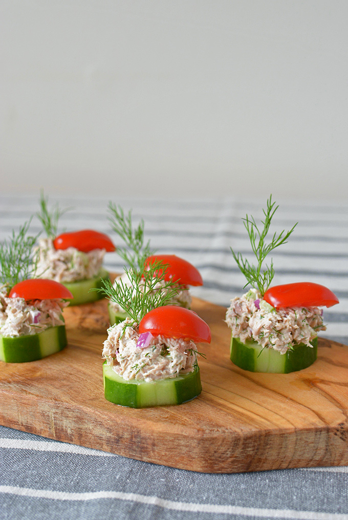 Cucumber Tuna Salad Bites - When the summer heat is at its peak, sometimes you just don't feel like cooking. Thankfully, these tasty little party appetizers are cool, crunchy, and require ZERO oven time! | SimpleSeasonal.com