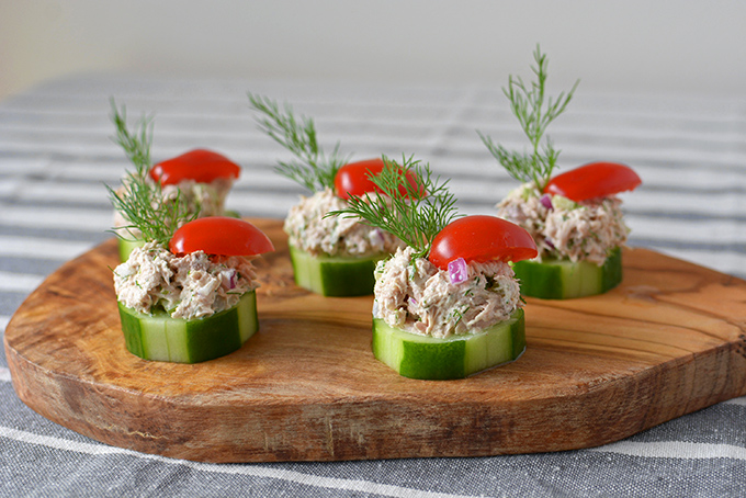 Cucumber Tuna Salad Bites - When the summer heat is at its peak, sometimes you just don't feel like cooking. Thankfully, these tasty little party appetizers are cool, crunchy, and require ZERO oven time! | SimpleSeasonal.com