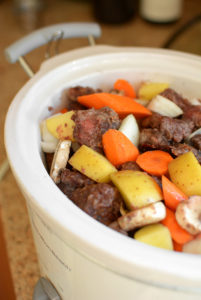 Assembling Stew in Slow Cooker