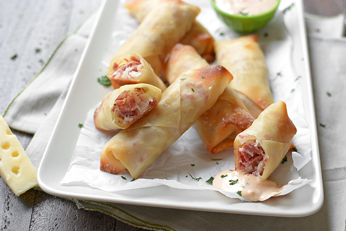 Baked Reuben Egg Rolls - When the leprechauns are done with their holiday mischief, this fun recipe is a tasty way to use up all that leftover corned beef!