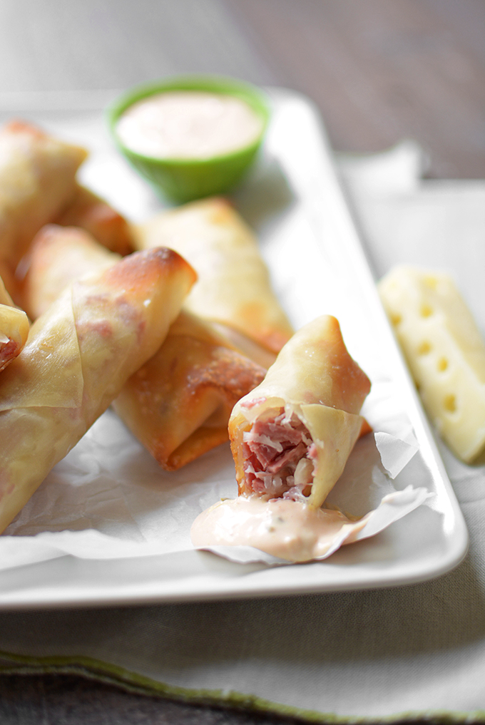 Baked Reuben Egg Rolls - When the leprechauns are done with their holiday mischief, this fun recipe is a tasty way to use up all that leftover corned beef!