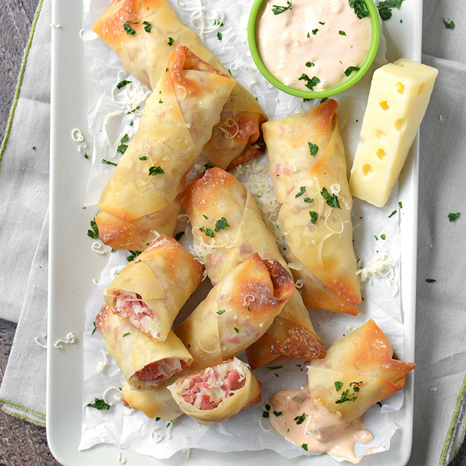 Baked Reuben Egg Rolls - When the leprechauns are done with their holiday mischief, this fun recipe is a tasty way to use up all that leftover corned beef!