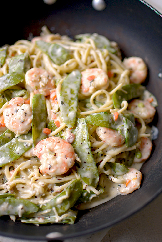 One-Pot Shrimp and Snow Pea Alfredo Pasta - Comfort food meets fresh spring veggies in this simple, creamy, and delicious Italian dinner.