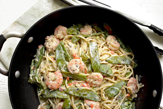 One-Pot Shrimp and Snow Pea Alfredo Pasta - Comfort food meets fresh spring veggies in this simple, creamy, and delicious Italian dinner.
