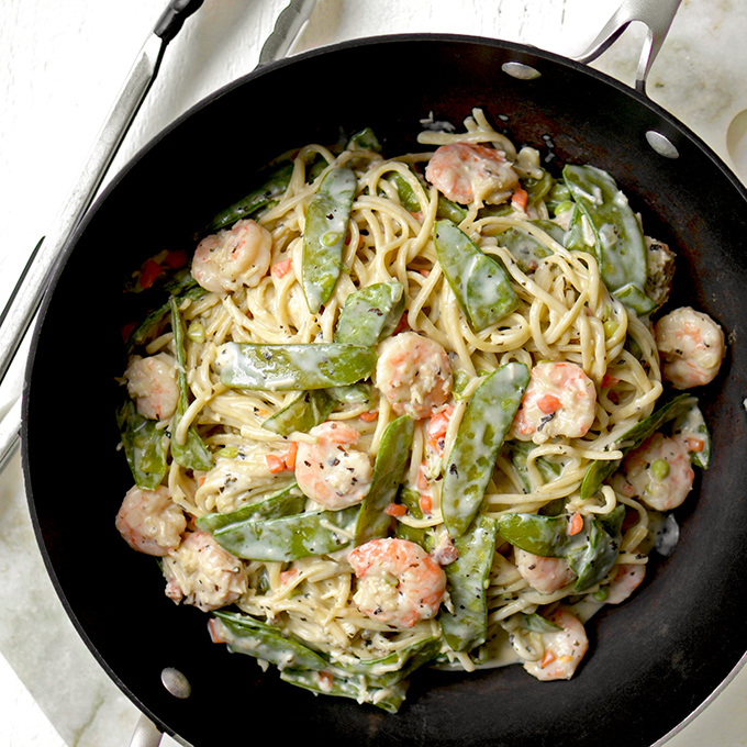 One-Pot Shrimp and Snow Pea Alfredo Pasta - Comfort food meets fresh spring veggies in this simple, creamy, and delicious Italian dinner.