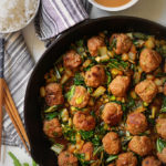 One-Pot Asian Meatballs with Bok Choy and Peanut Sauce