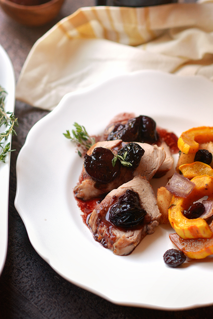 Closeup of pork tenderloin with cherry sauce