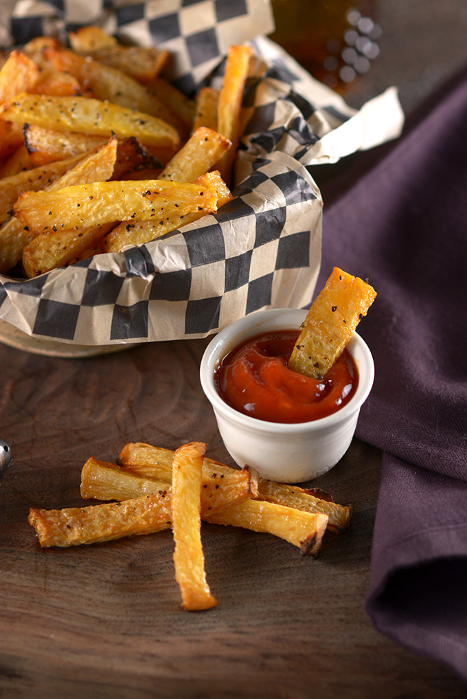 Dipping Rutabaga Fry in Ketchup