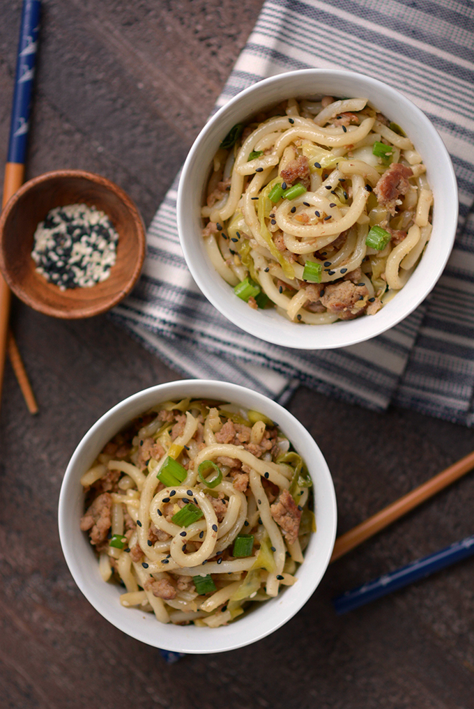 Overhead shot of Pork and Cabbage Udon Noodles with Black Sesame Seeds