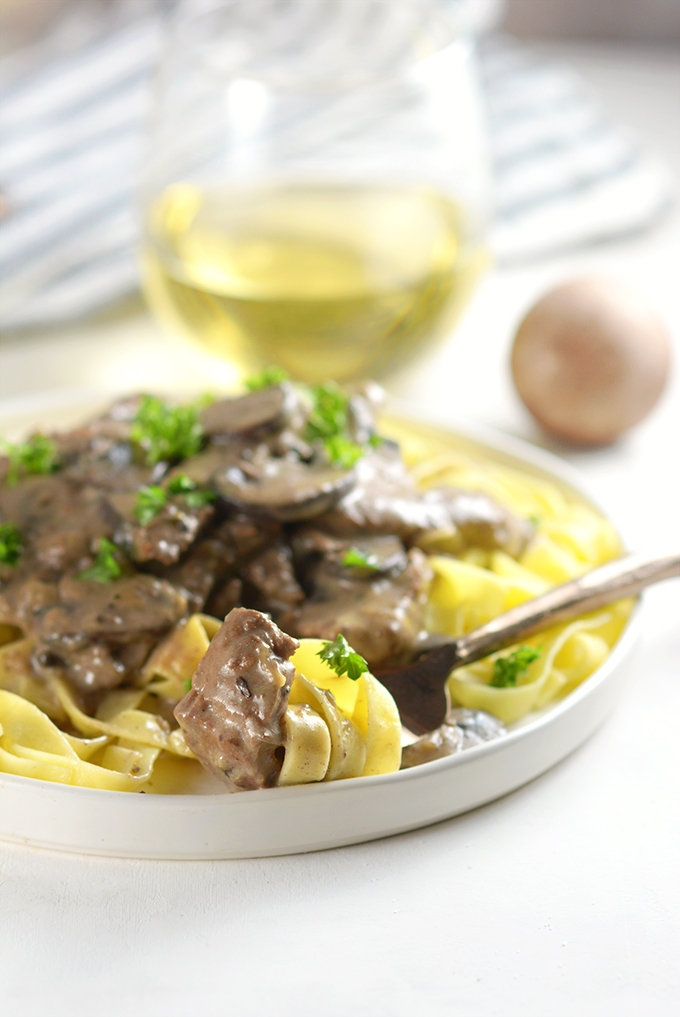 bite-of-beef-stroganoff-on-fork-with-pasta