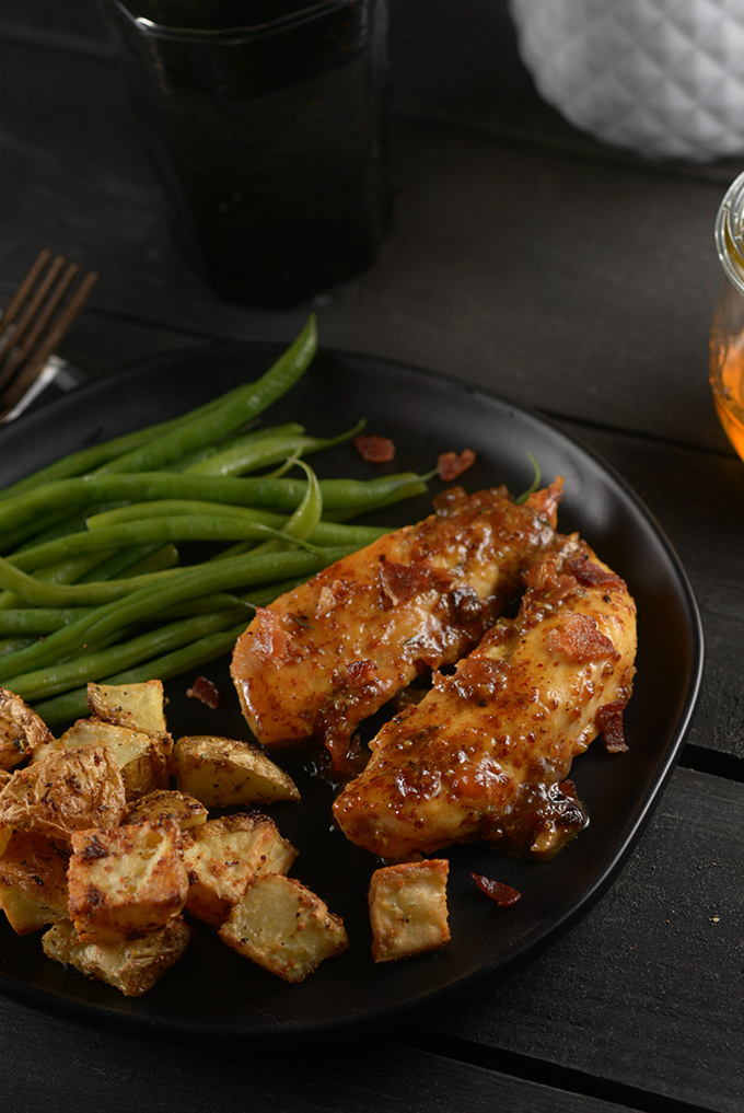 Quick and Easy Honey Mustard Chicken on a plate with green beans and potatoes