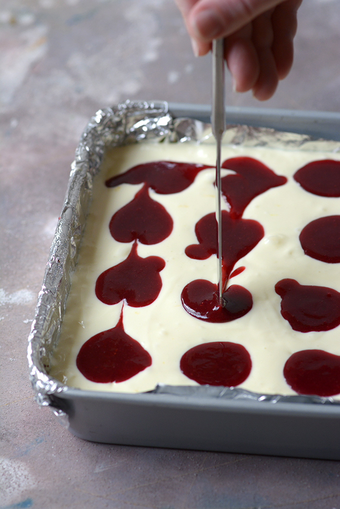 Swirling Berry Sauce in Cheesecake