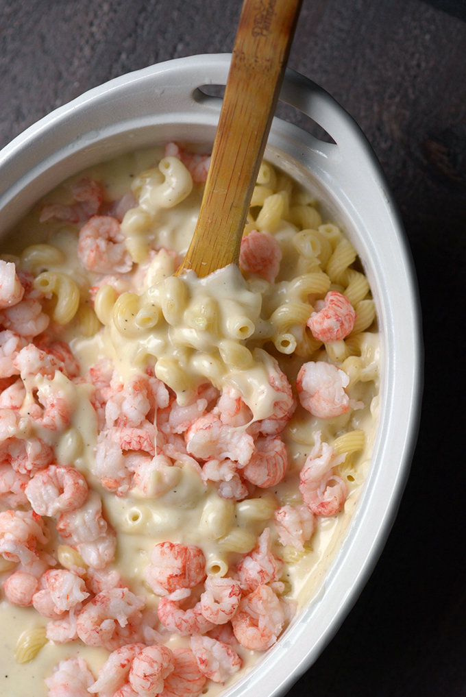 Mixing Langostino Mac 'n Cheese in a Casserole Dish