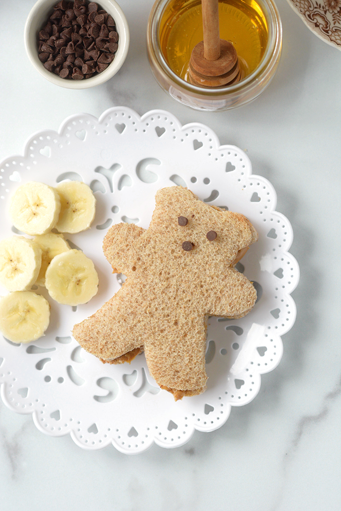 Overhead shot of Peanut Butter and Honey Bear Tea Sandwiches with Bananas