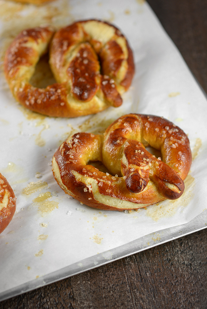 homemade soft pretzels on a baking sheet