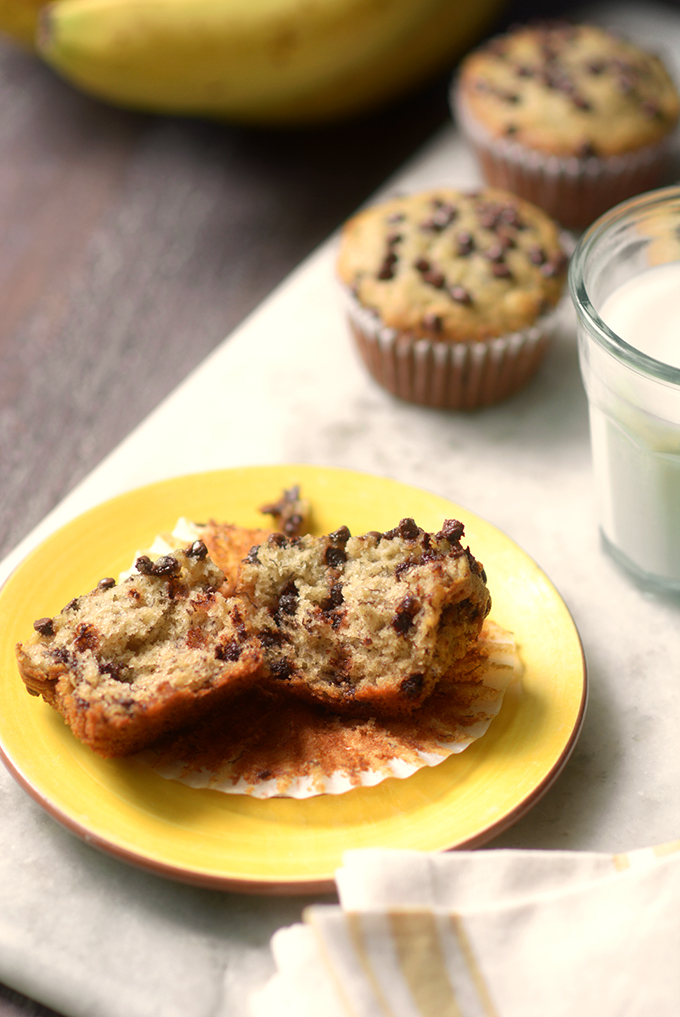 banana chocolate chip muffins broken in half